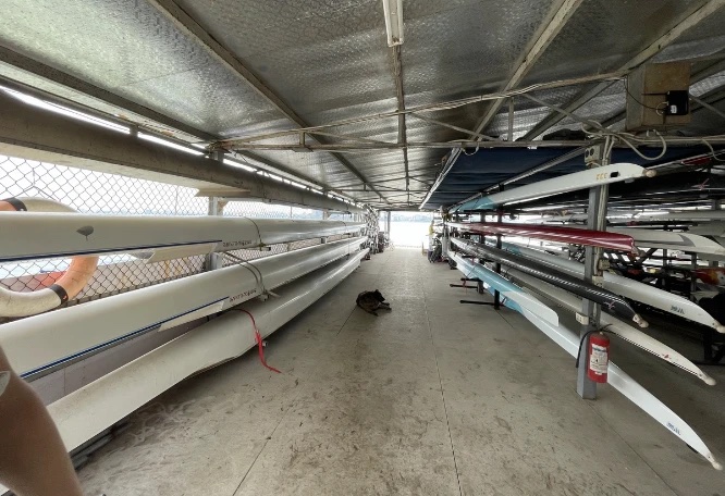 Racing boats stored in the boathouse